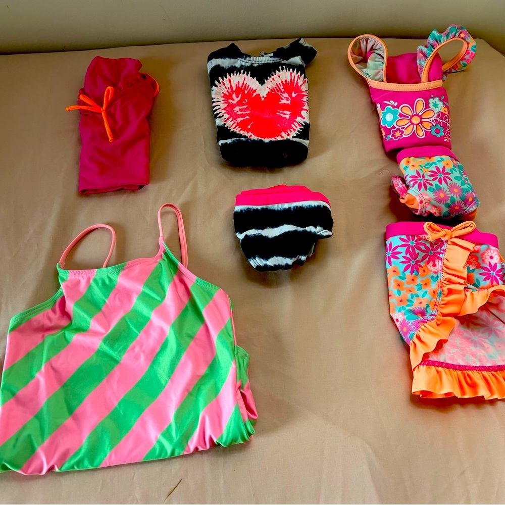 Girls Swimsuit bundle of four: 3 size 5/6, 1 size 6/7